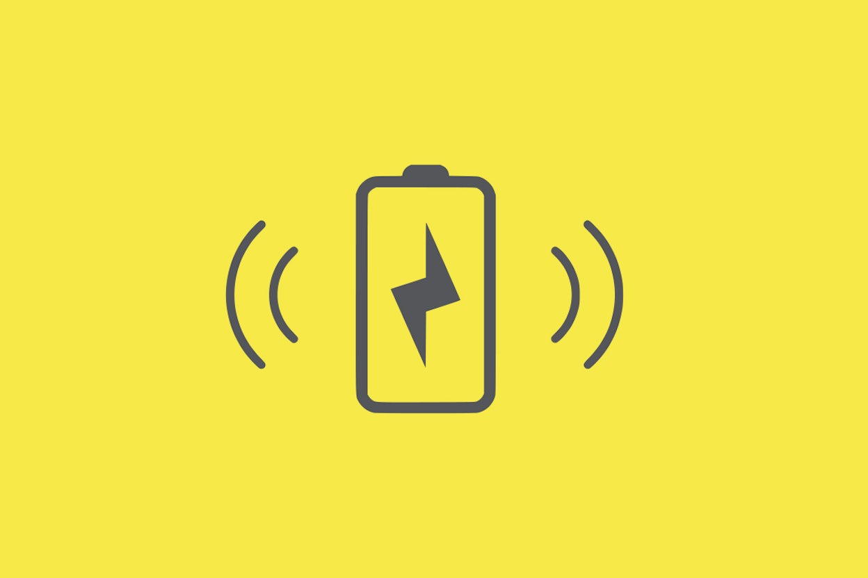 Wireless charging symbol on yellow background.