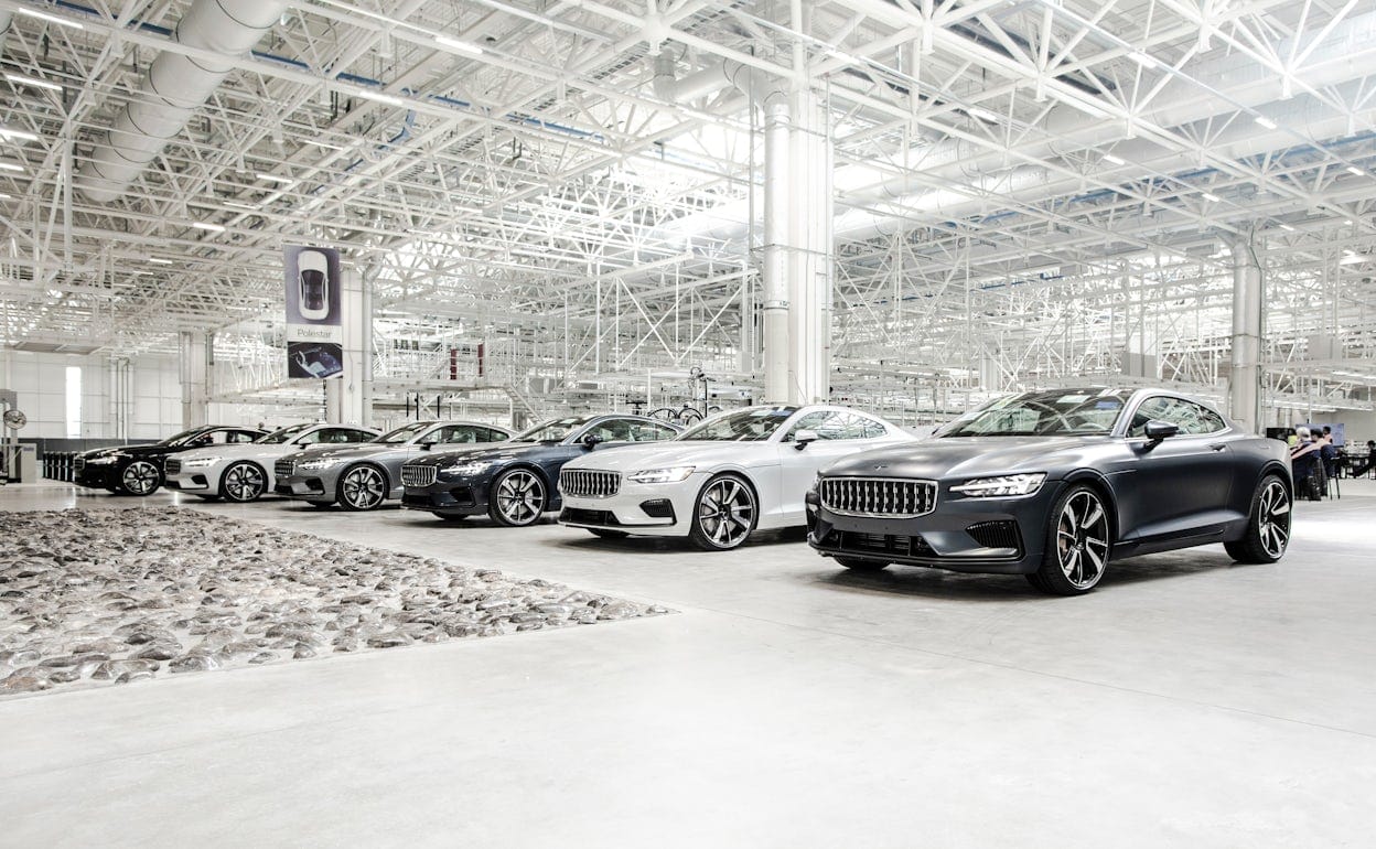 Line up of six pristine Polestar cars inside the Polestar Production Centre in Chengdu, China.