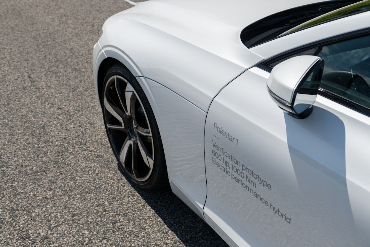 Close-up of the left front of a white Polestar 1.
