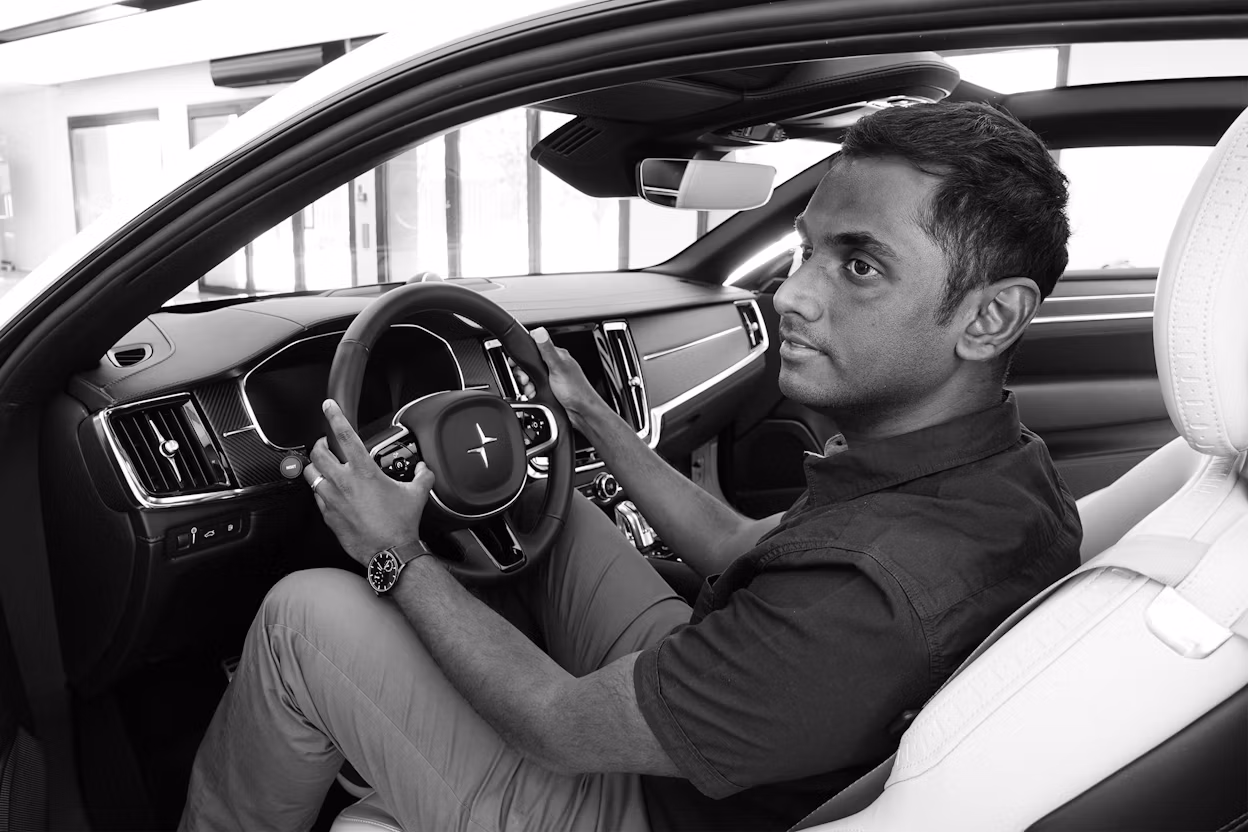 Aloka Muddukrishna sitting in the driver's seat of a Polestar.