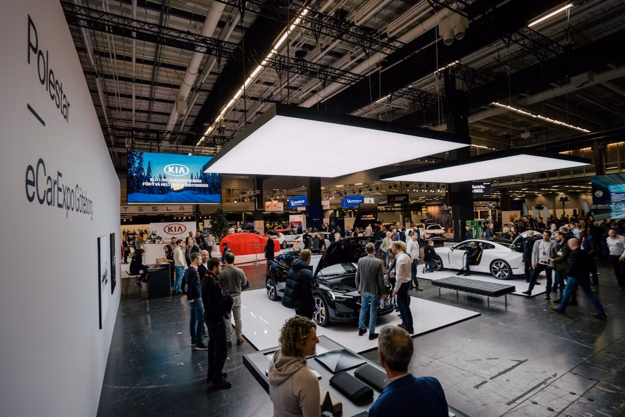 Event visitors inspecting Polestar cars at Ecar expo 2019.