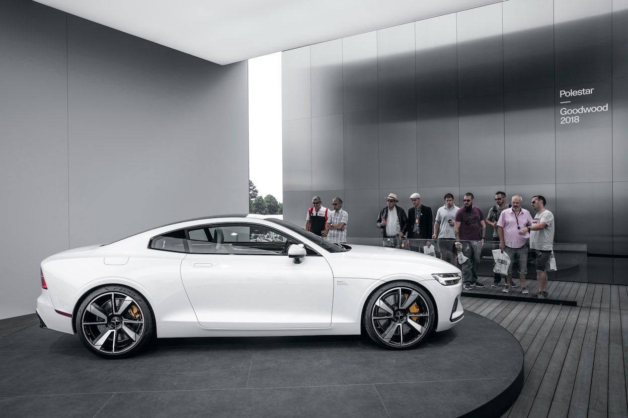 Side view of a white Polestar on display at the Goodwood Festival of Speed.