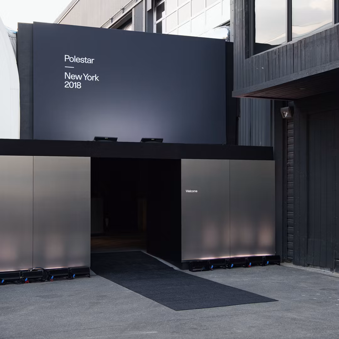The entrance to a building with a sign that reads Polestar New York 2018.