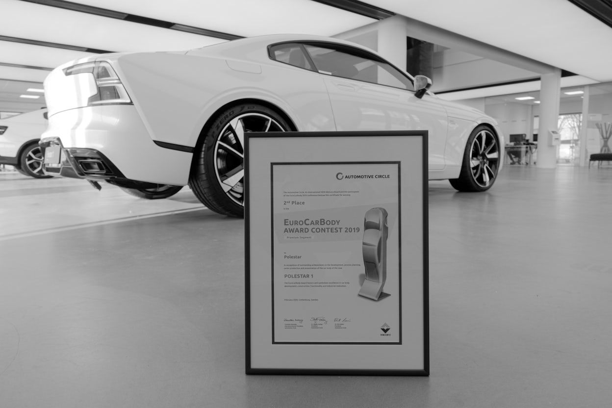 The Eurocarbody award contest in front of a white Polestar 1