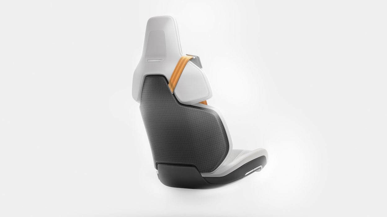 A grey and white Polestar seat on a white background