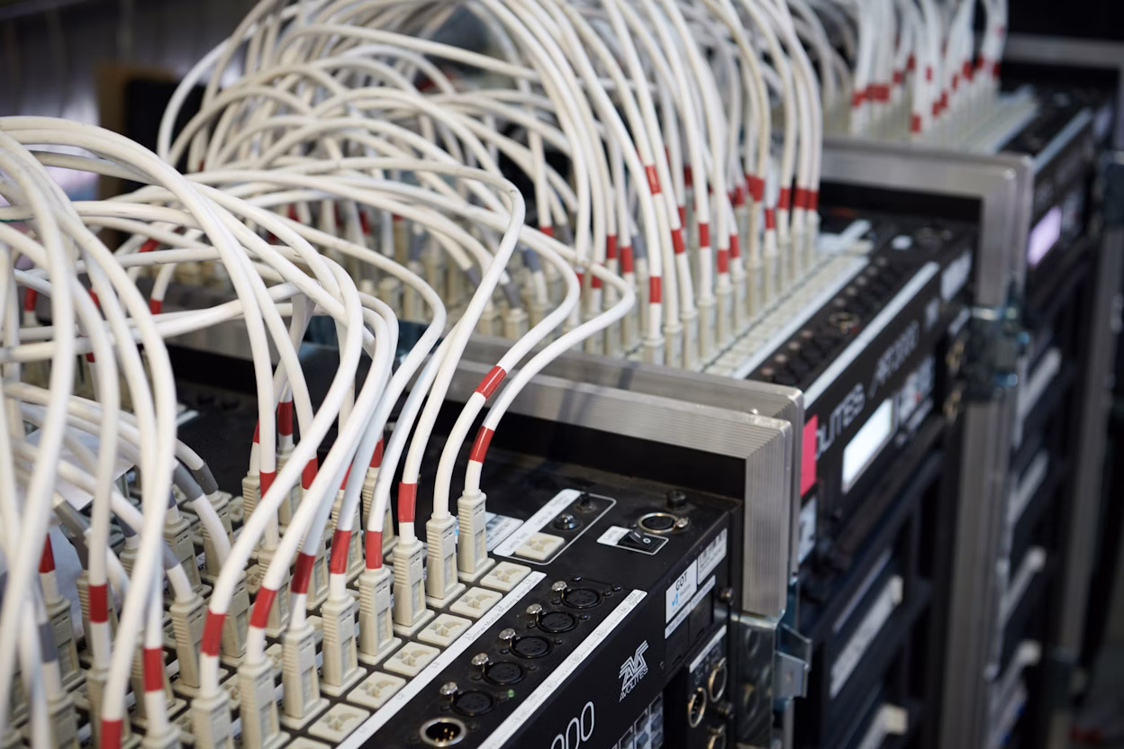 Cables connected to server racks.