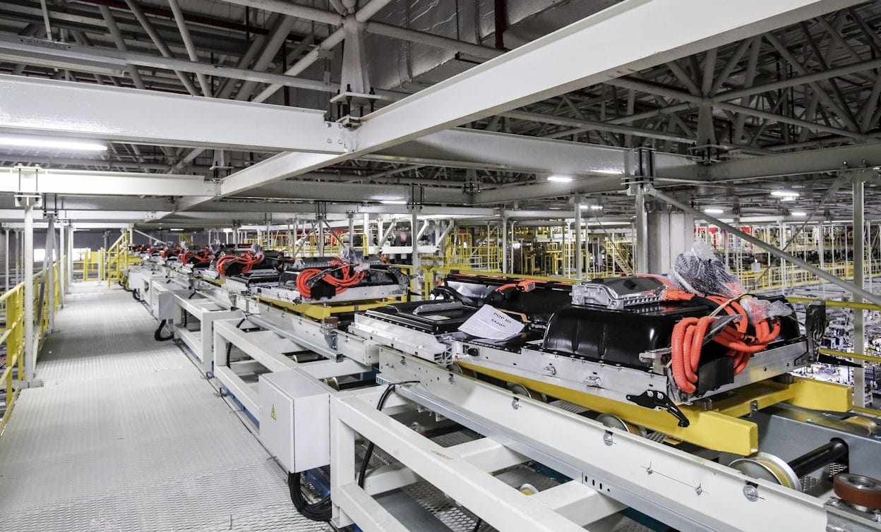 A line of Polestar 2 chassis on the production floor