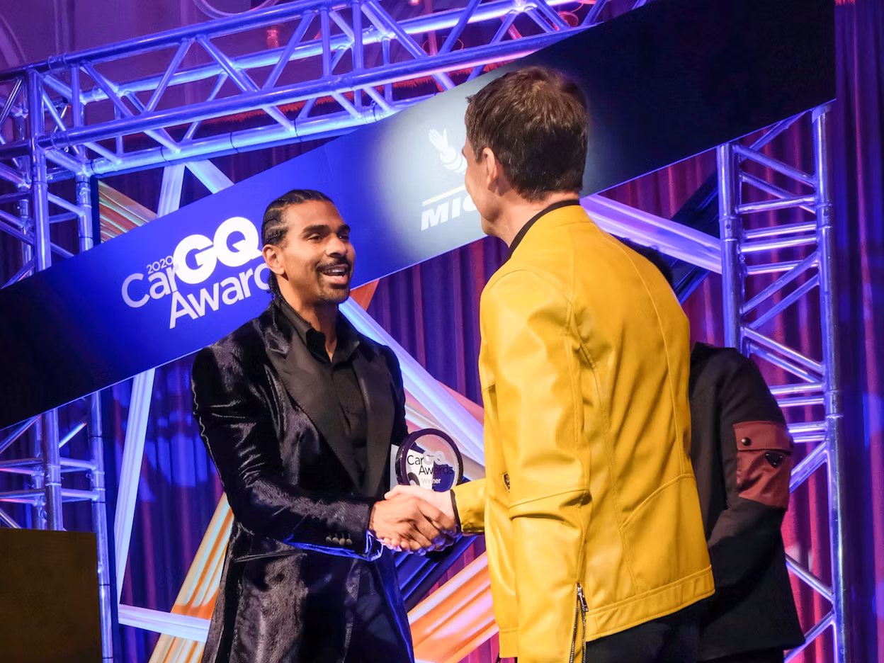 Thomas Ingenlath receiving the 2020 GQ Car Award on stage.