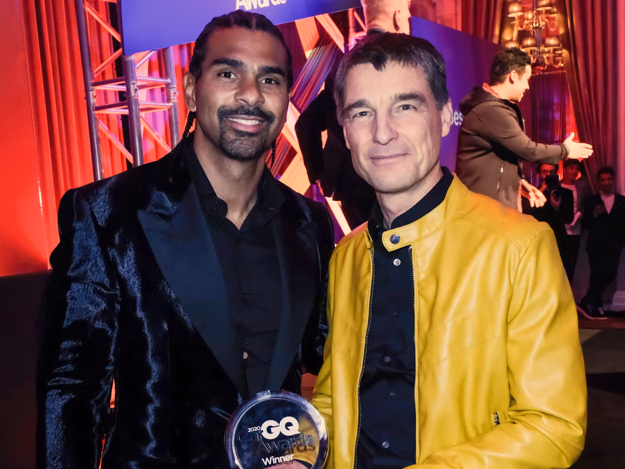 Thomas Ingenlath photographed with the GQ host and holding the 2020 GQ Car Award.