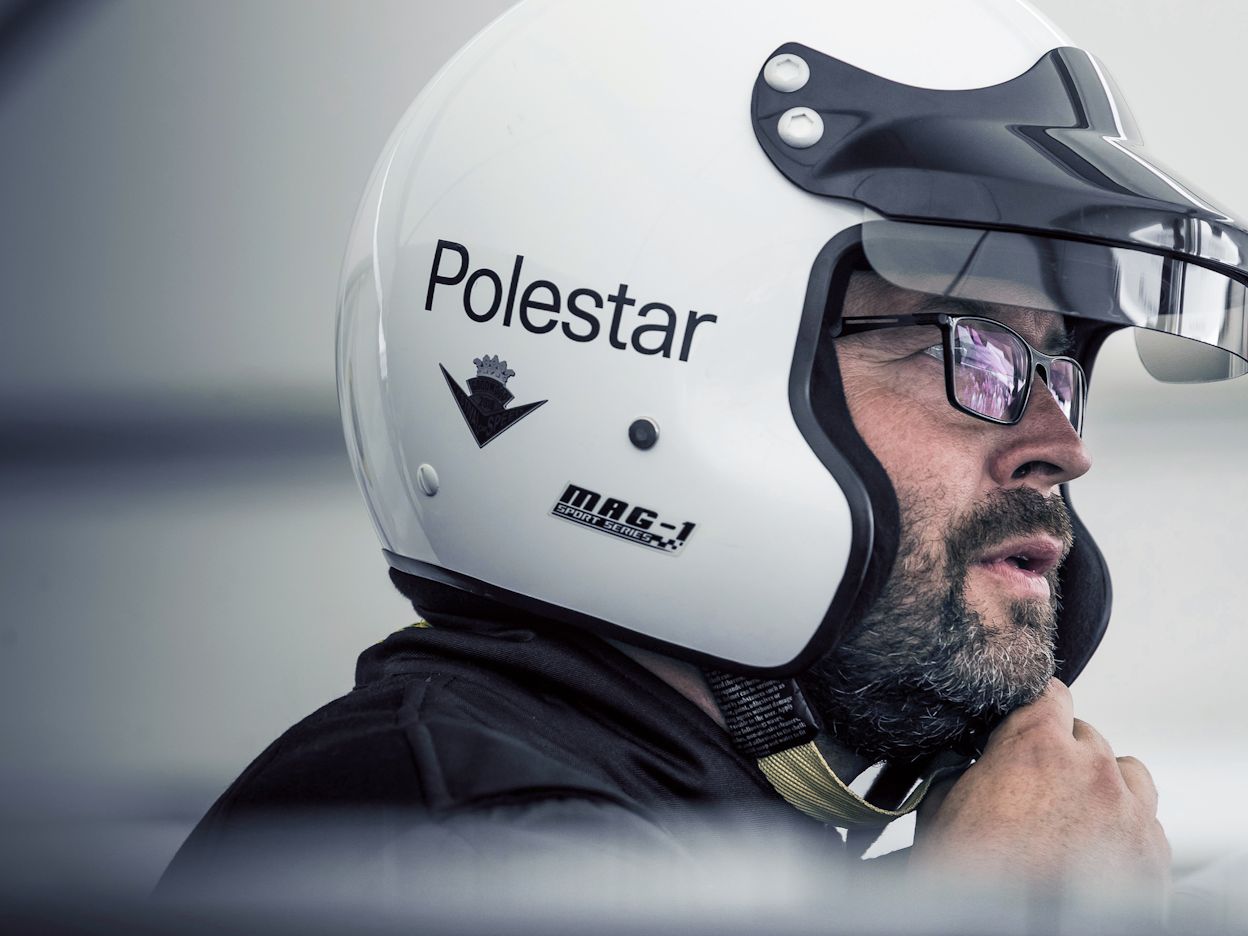 Joakim Rydholm wearing a Polestar racing helmet.
