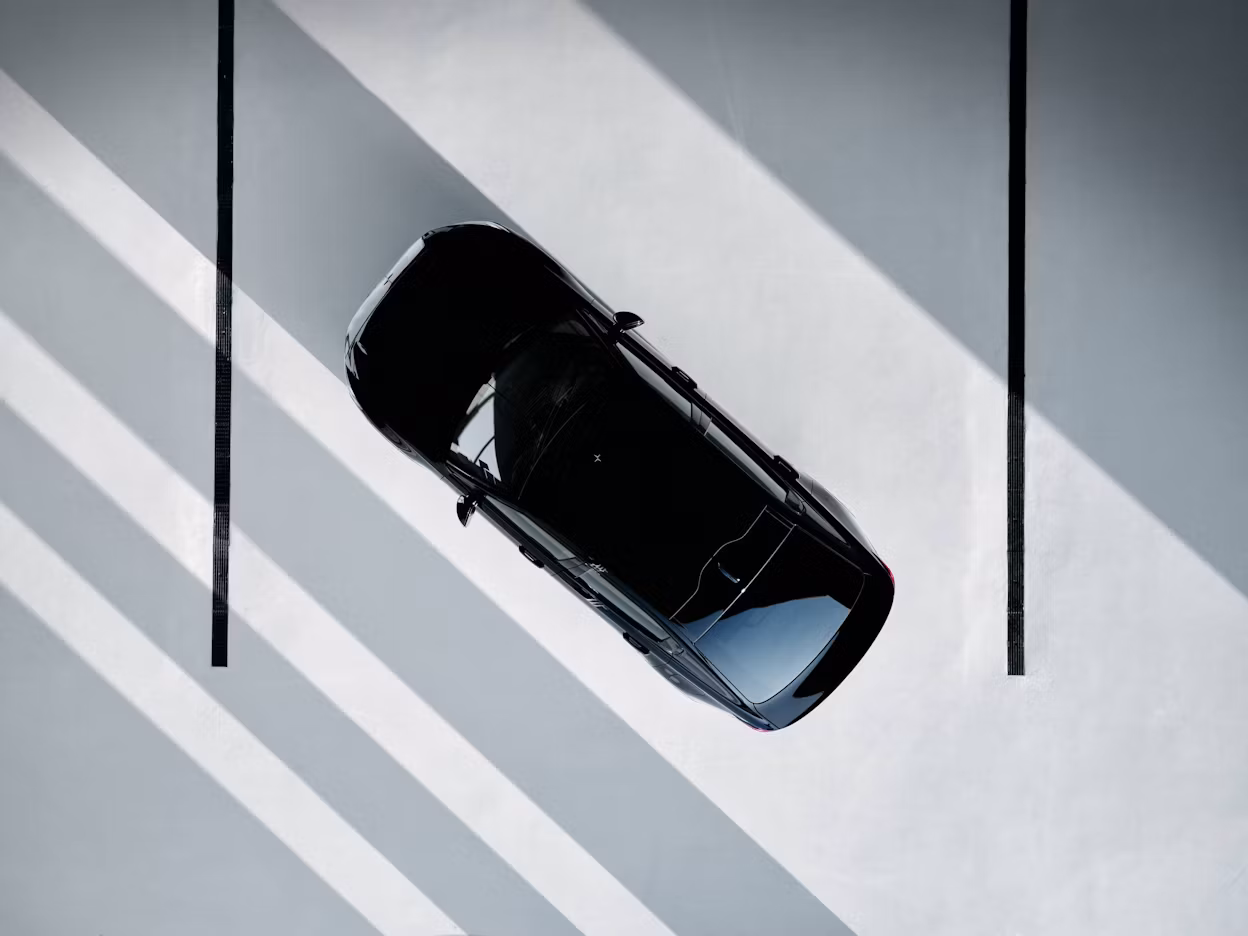 Bird's-eye view of a black Polestar 2.