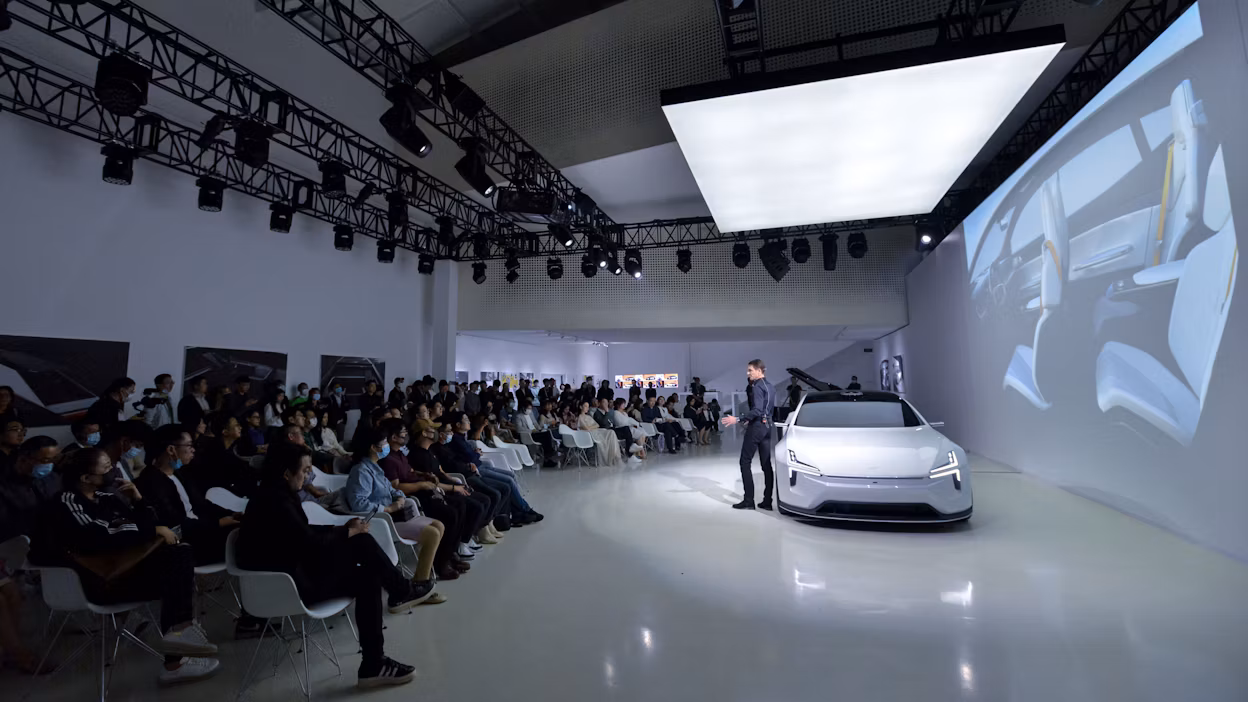 Polestar CEO Thomas Ingenlath presents Polestar Precept on stage in Beijing.