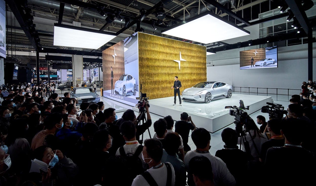 Thomas Ingenlath and a Polestar Precept on stage in front of a large crowd at the 2020 Beijing Auto Show.