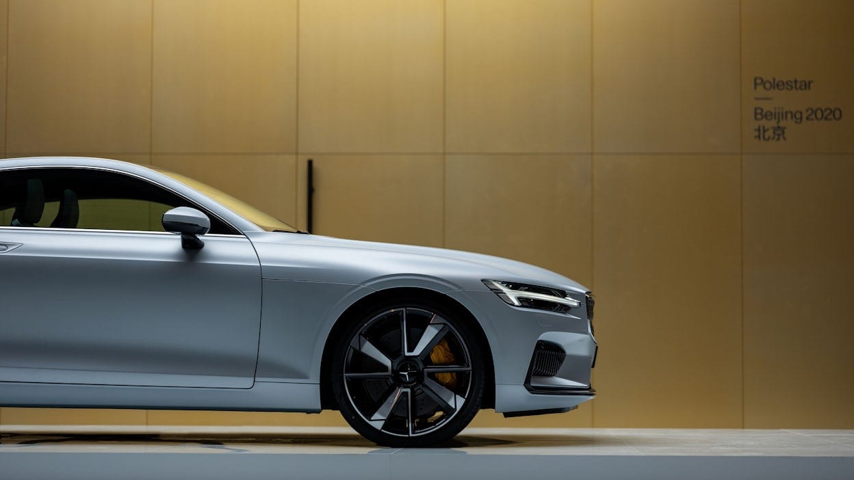Polestar 1 in front of a panelled wall at the 2020 Beijing Auto Show.