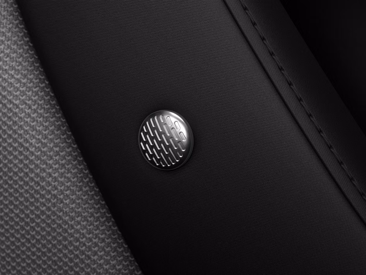 Close-up of the Harman Kardon button in the Polestar 2.