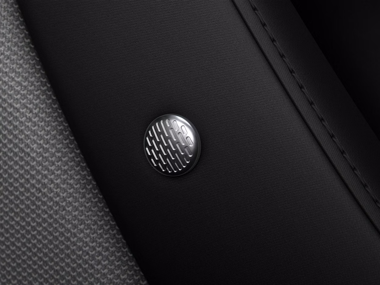Close-up of the Harman Kardon button in the Polestar 2.