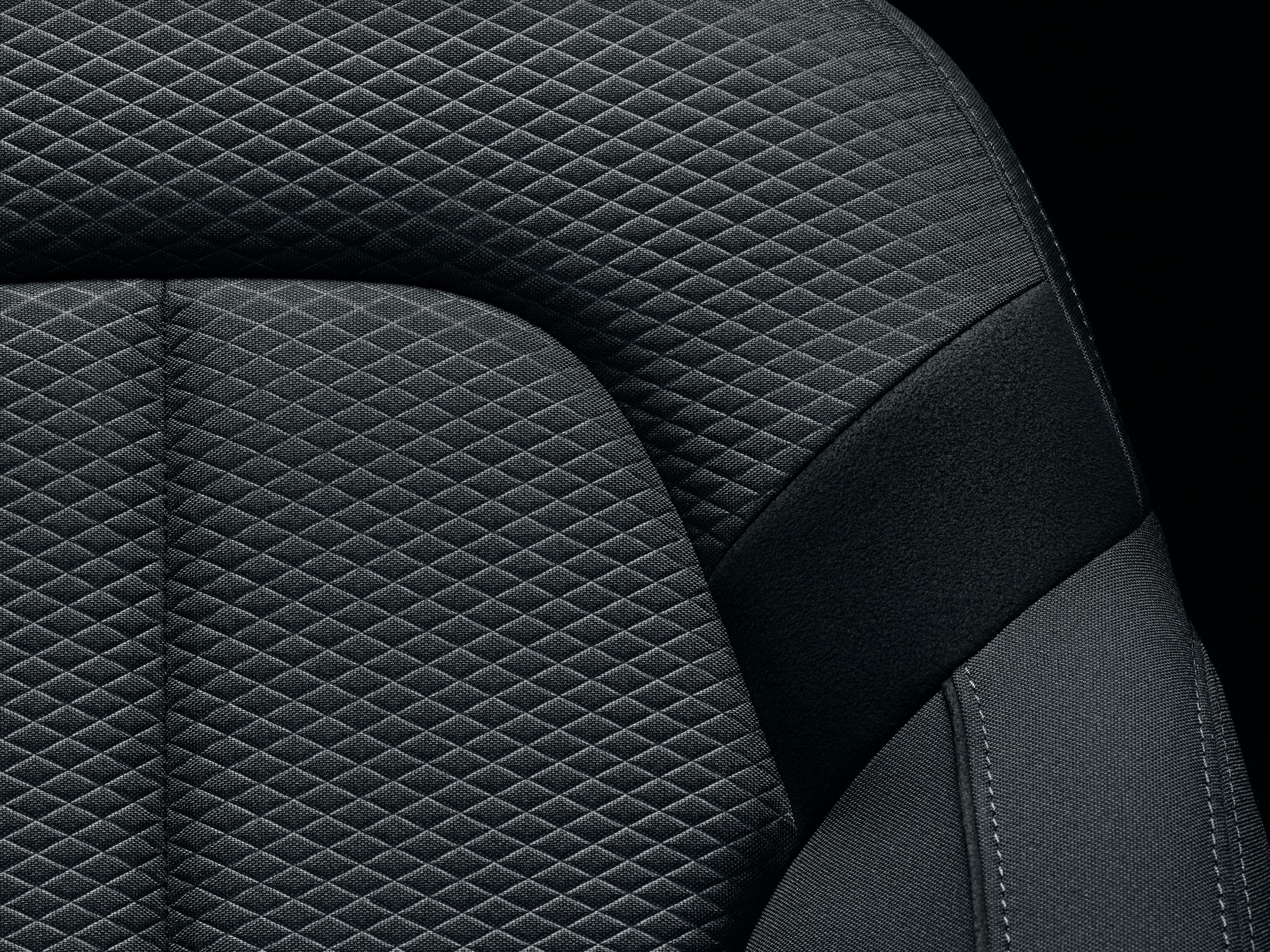 Close-up of textile of black car seat 