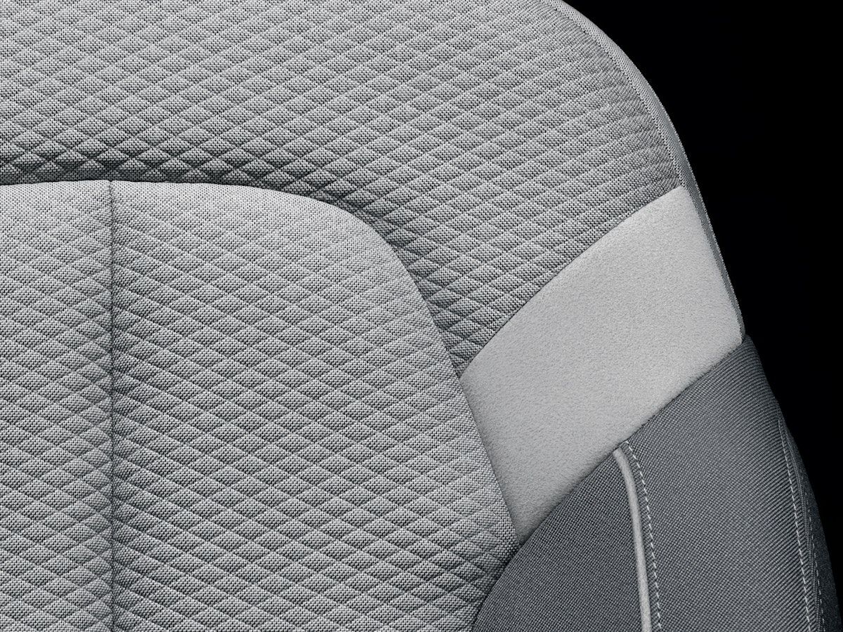 Close-up of textile of grey car seat 