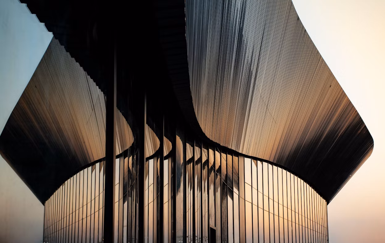 The Polestar Chengdu facility, a modern glass building.