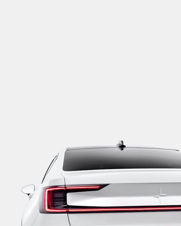 Back of the Polestar 2 with exterior snow on white background
