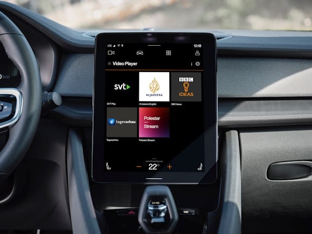 Front view of in-car display in Polestar 2 showing different apps 