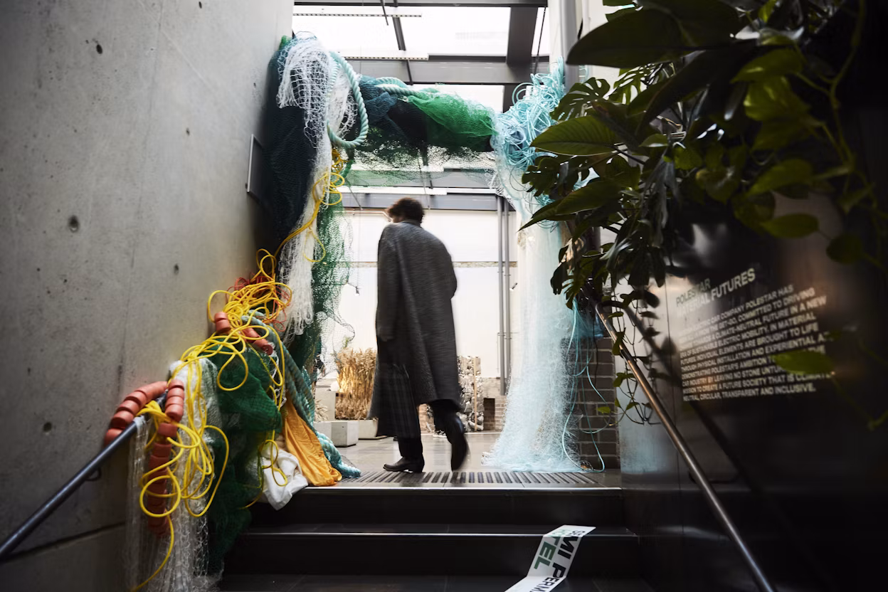 Man leaving the Polestar exhibit at Semi Permanent Hotel.