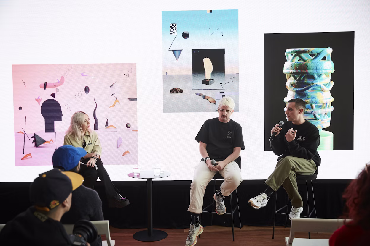 Two men and a woman speaking during a panel discussion at Semi Permanent Hotel.