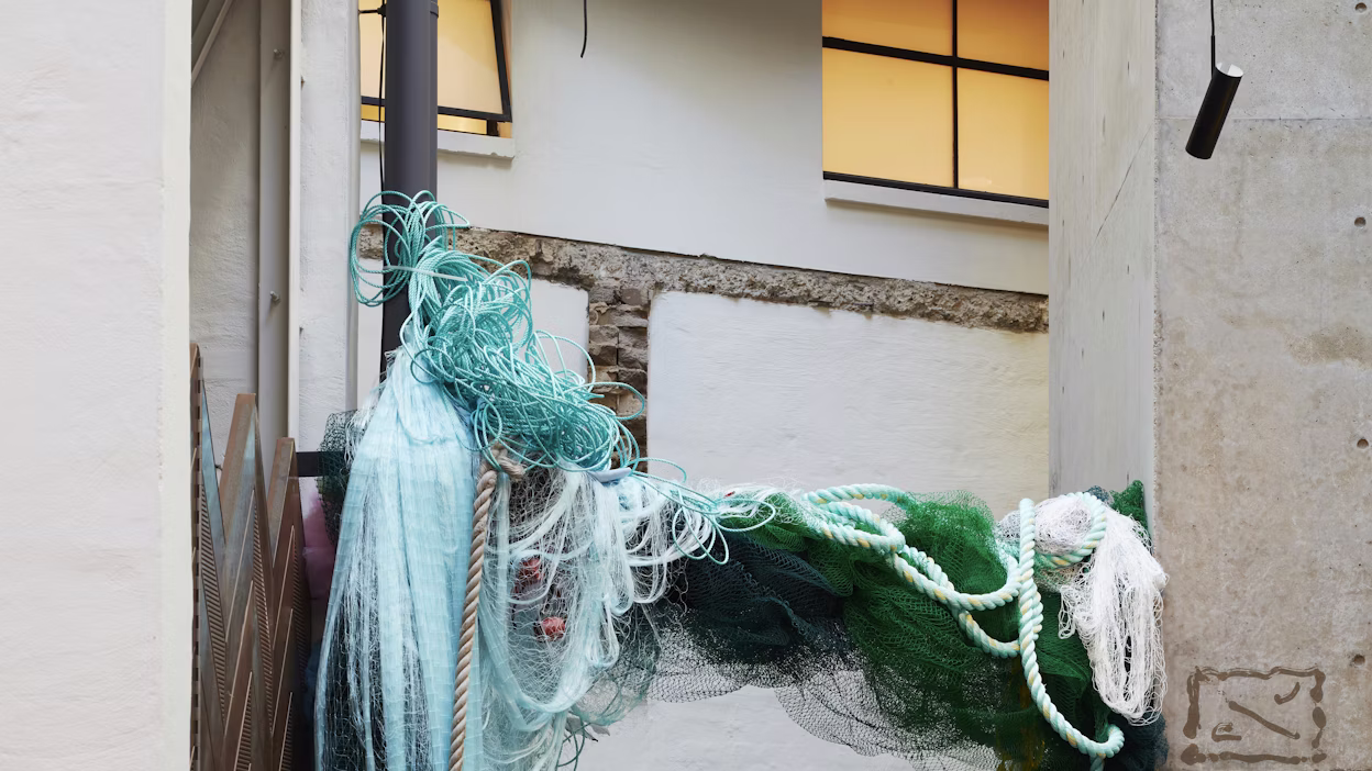 Constellation of fish nets hanging at the Semi Permanent Hotel.