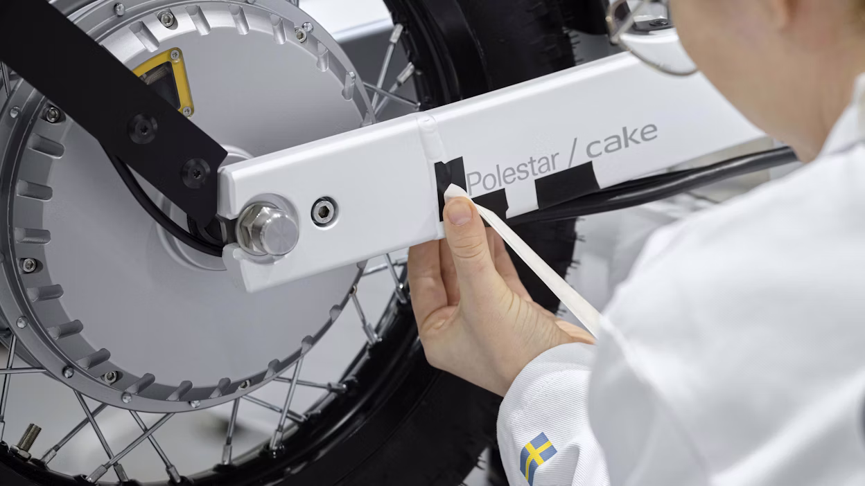 Close up of a technician working on a Makka electric bike.