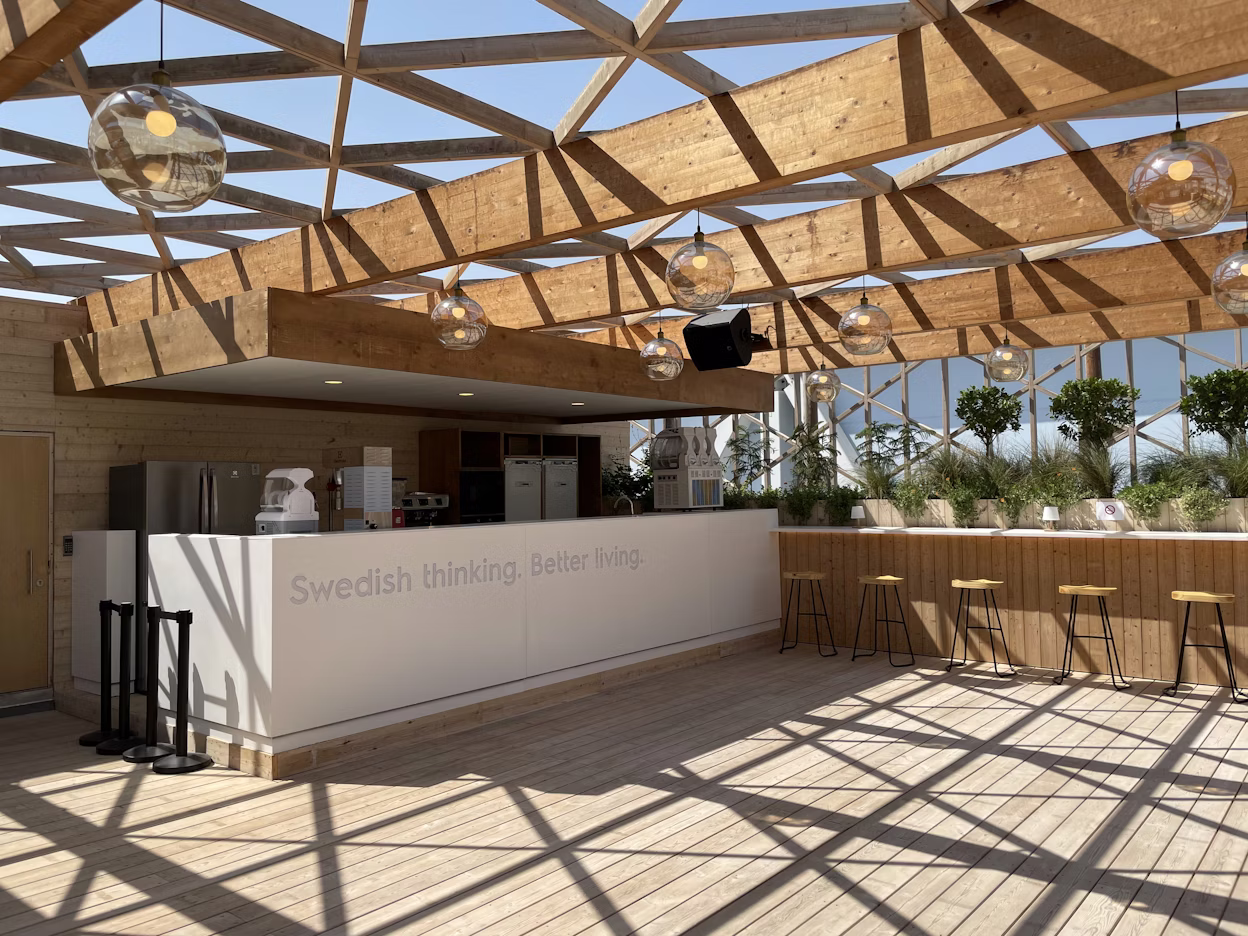 Lounge area with a bar and bar stools at the Expo 2020 Dubai.