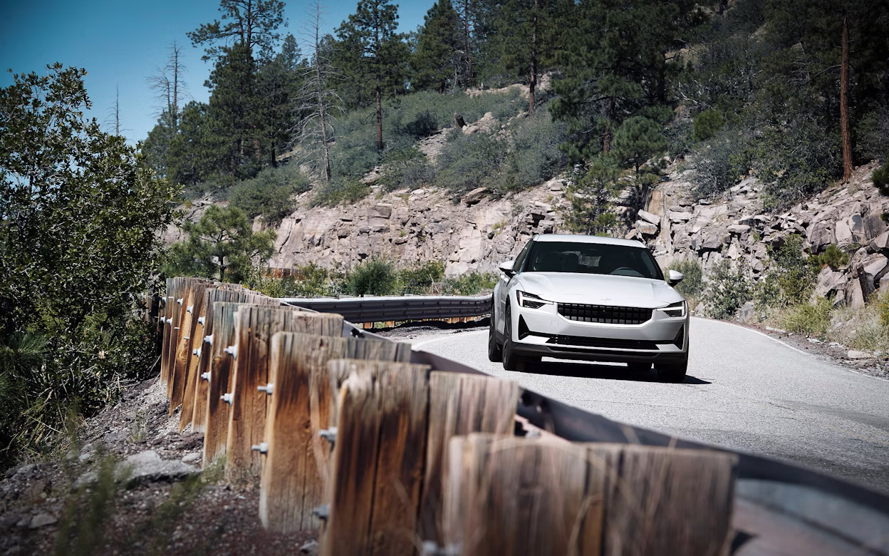 Front view of a white Polestar 2 on the road in New Mexico.