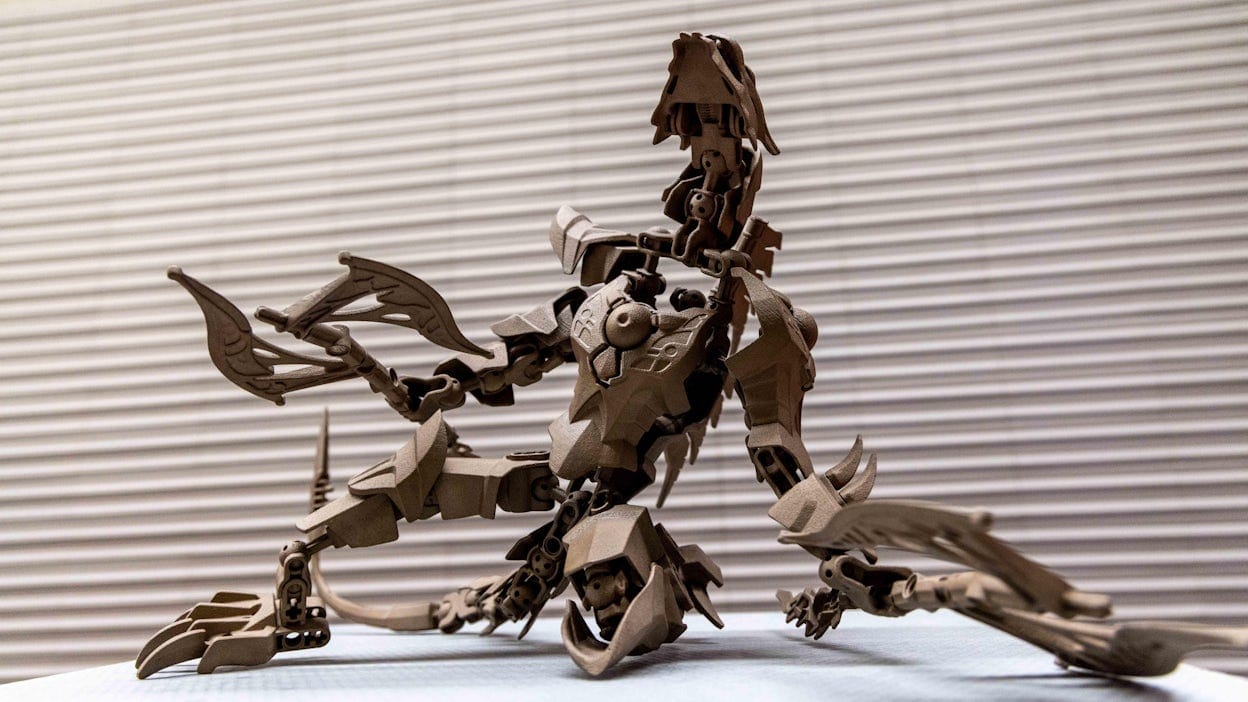 Art piece 'Brain Activity' resembling a robot made out of beige plastic