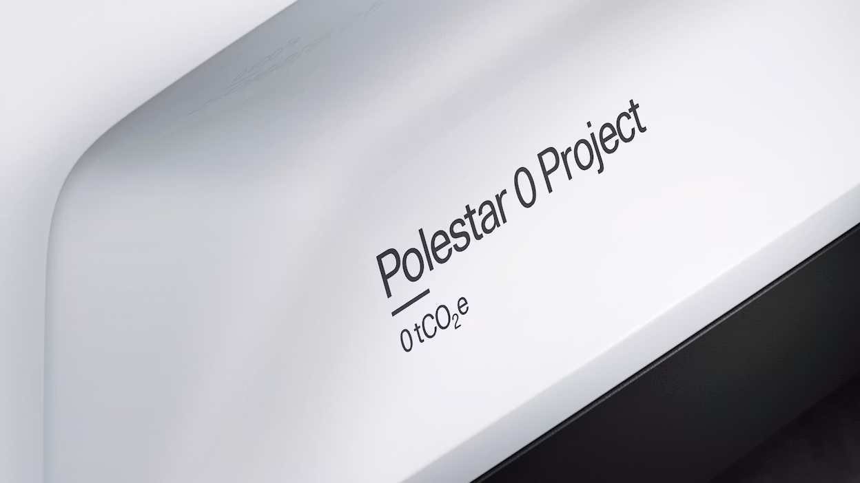 Text on a white Polestar 2 saying Polestar 0 project