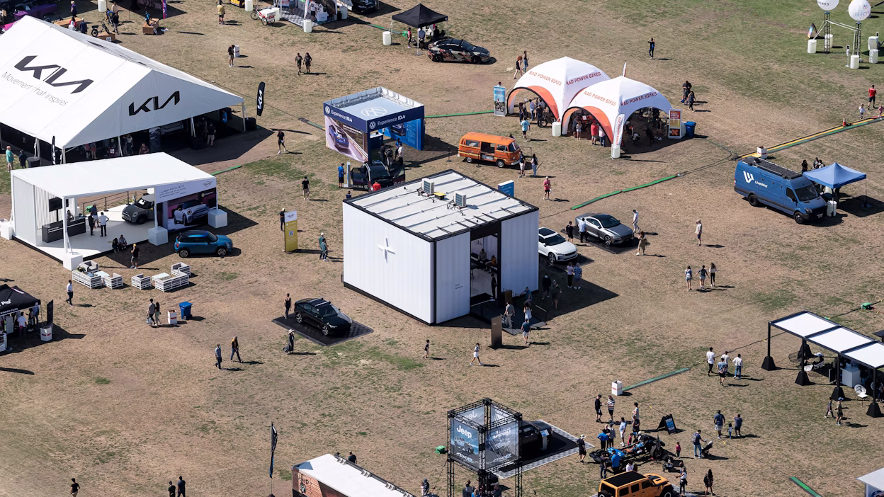 Bird's-eye view of crowd walking the outdoor grounds at Electrify Expo 2021.