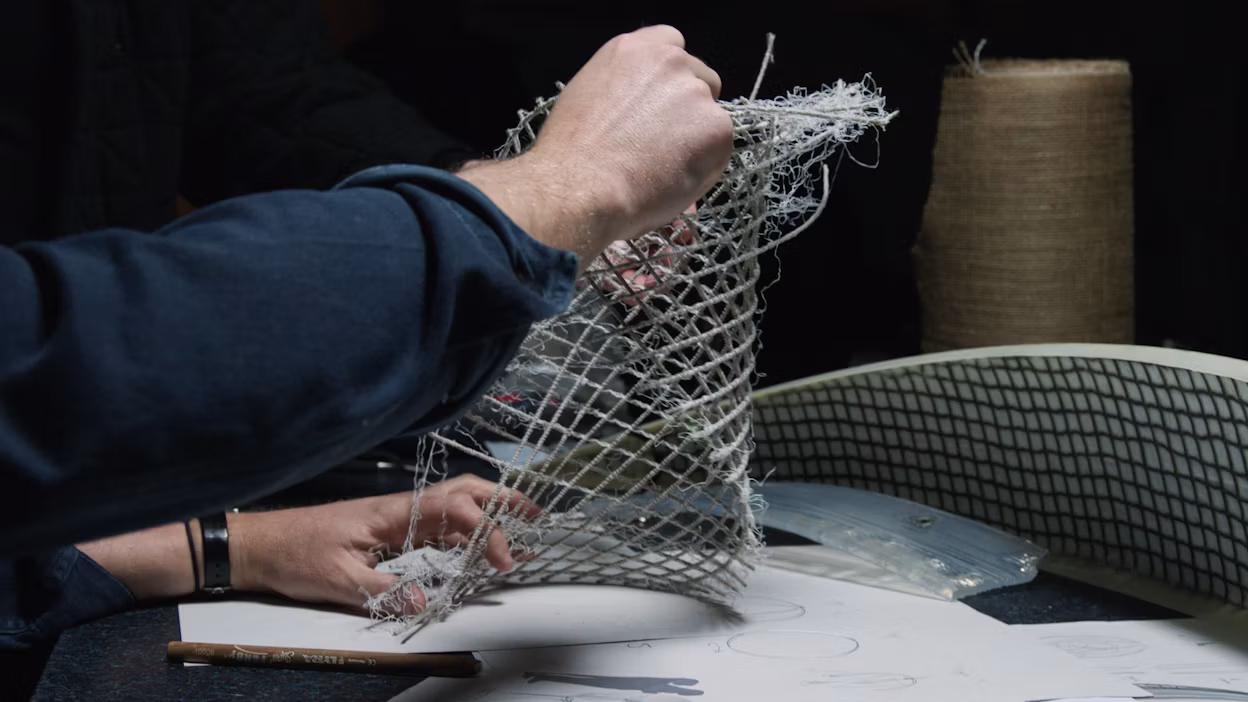 Man working on the bio-based flax composite of We Harvest Wind.