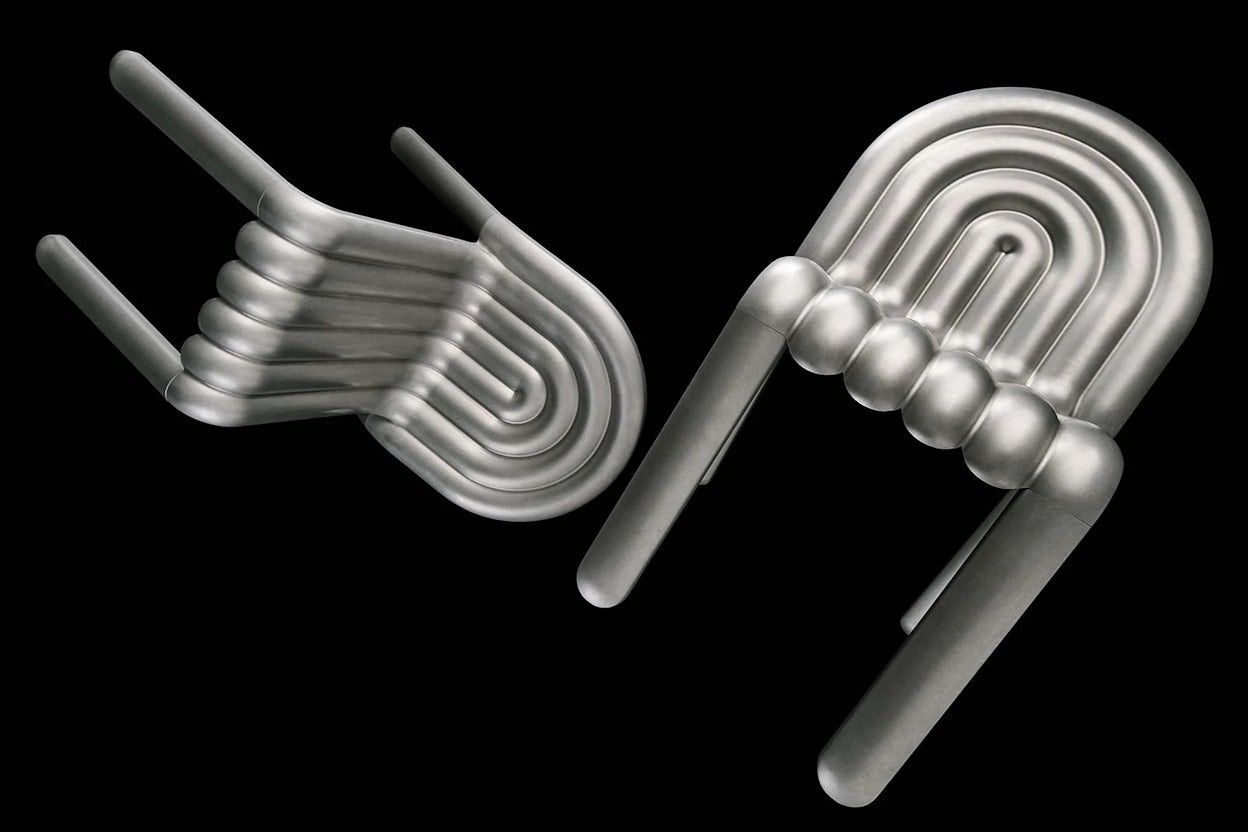 Image of two aluminium chairs. 