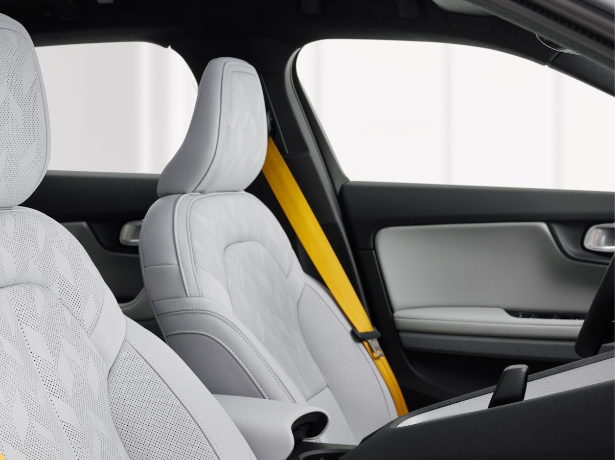 Interior with perforated nappa front seats and golden seat belts