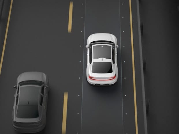 Visualisation of Blind Spot Information System with steer assist, one car overtaking another 