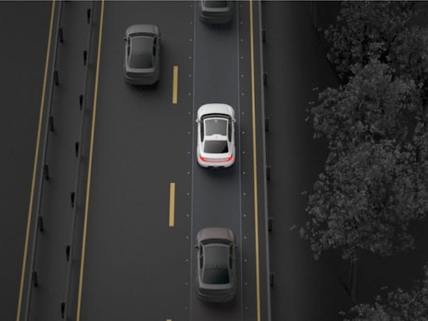 Visualisation of Rear Collision Warning and Mitigation, showing a car closing in from behind.
