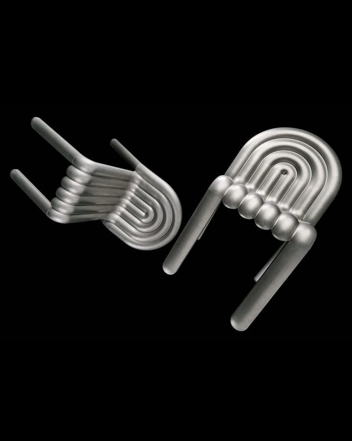 Image of two aluminium chairs. 