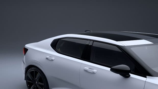 Side view showing tinted windows and panoramic glass roof