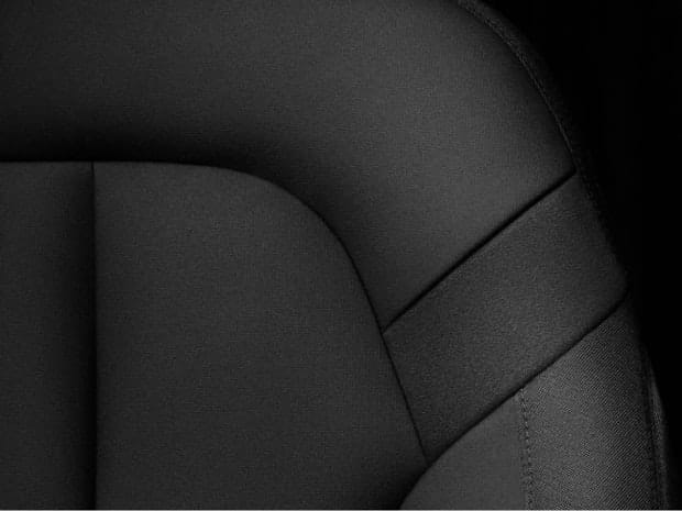 Close up of dark weavetech seat stiching
