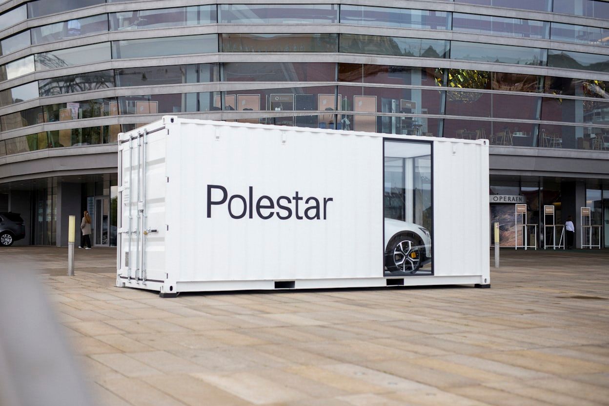 A Polestar displayed inside a container at the Global Fashion Summit.