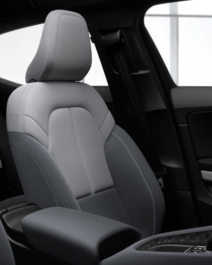 Details of grey front seats with embossed textile