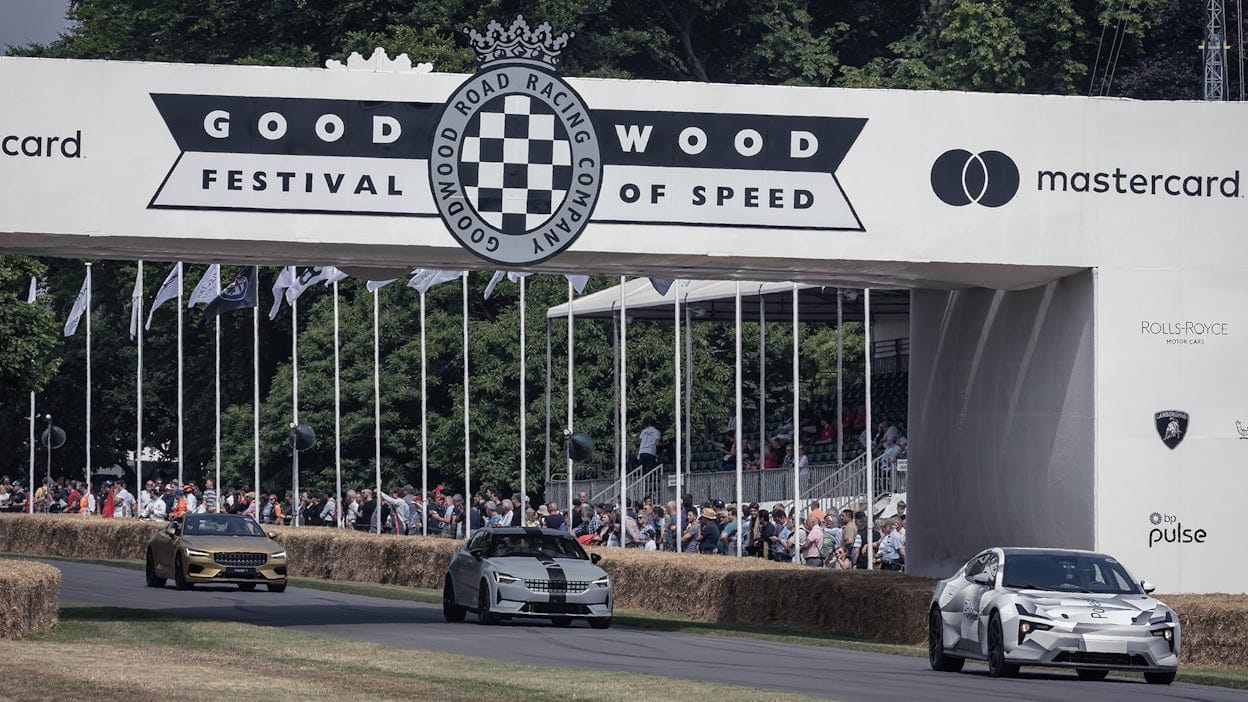 Polestar lineup at Goodwood Festival of Speed 2022 with crowd watching from the sidelines.