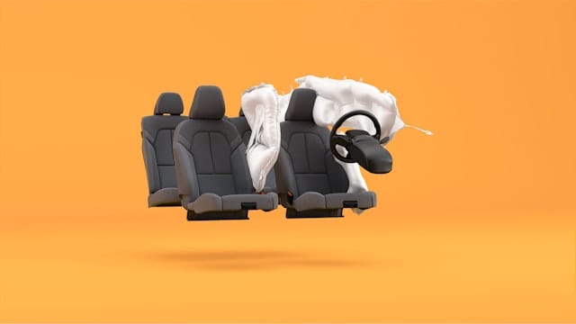 Showing driver's seats with frontal airbags, orange background.