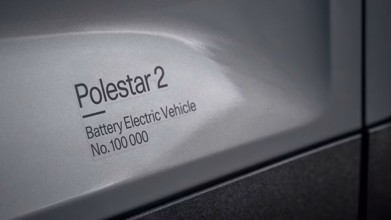 Polestar 2 Battery Electric Vehicle No. 100 000 written on the side of a Polestar 2.