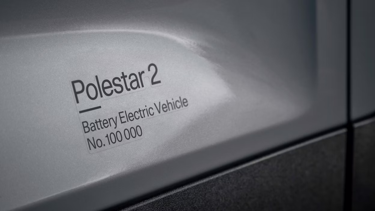 Polestar 2 Battery Electric Vehicle No. 100 000 written on the side of a Polestar 2.