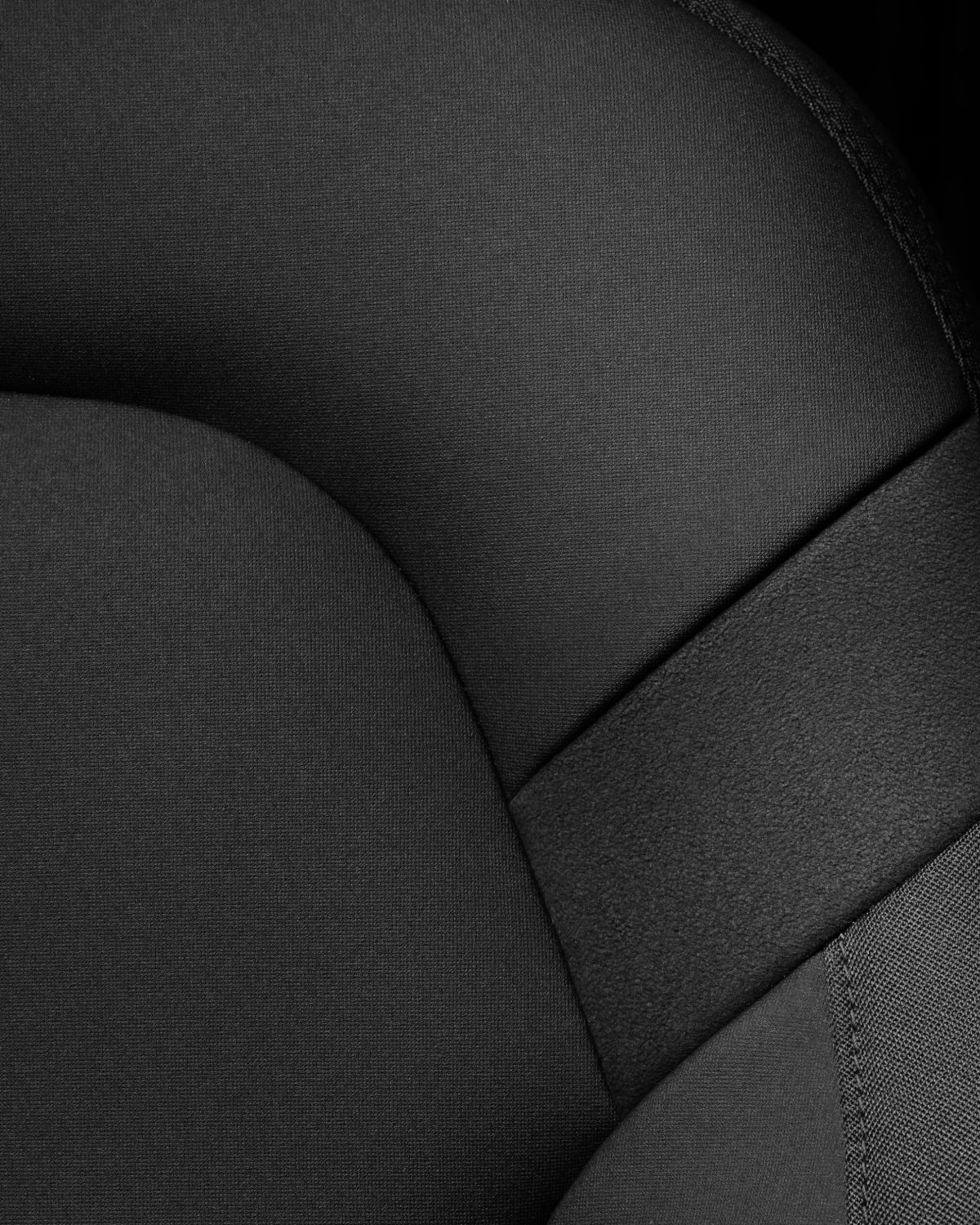 Close-up on a dark vegan material for seats.