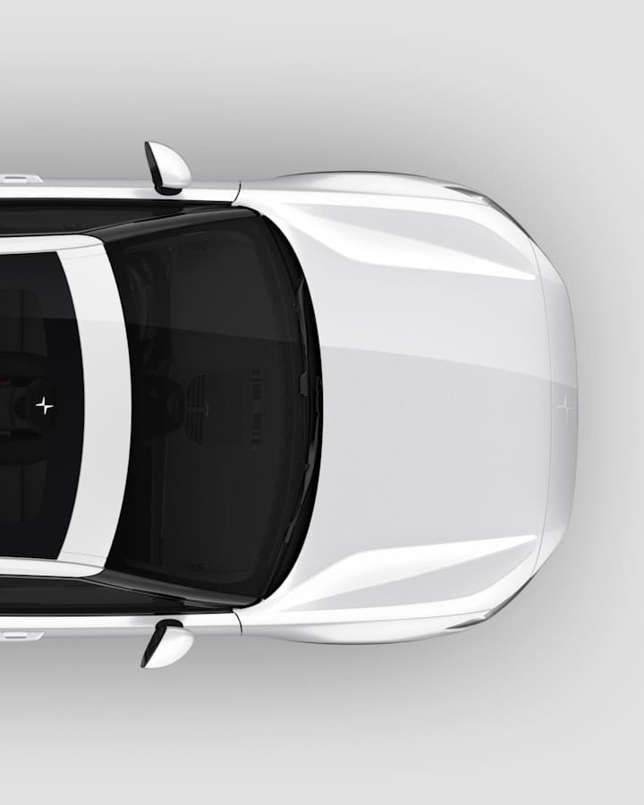 A white Polestar 2 from above showing the panoramic roof